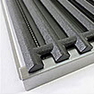 Cast iron grate with perforated tray